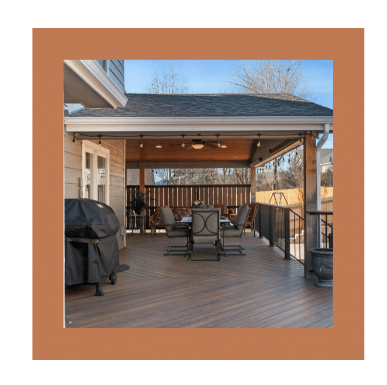 Covered patio with dining table and seating on rich brown TREX composite decking